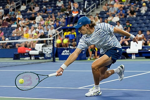 US Open Tennis: Alex de Minaur, of Australia, returns a shot to Jordan Thompson
